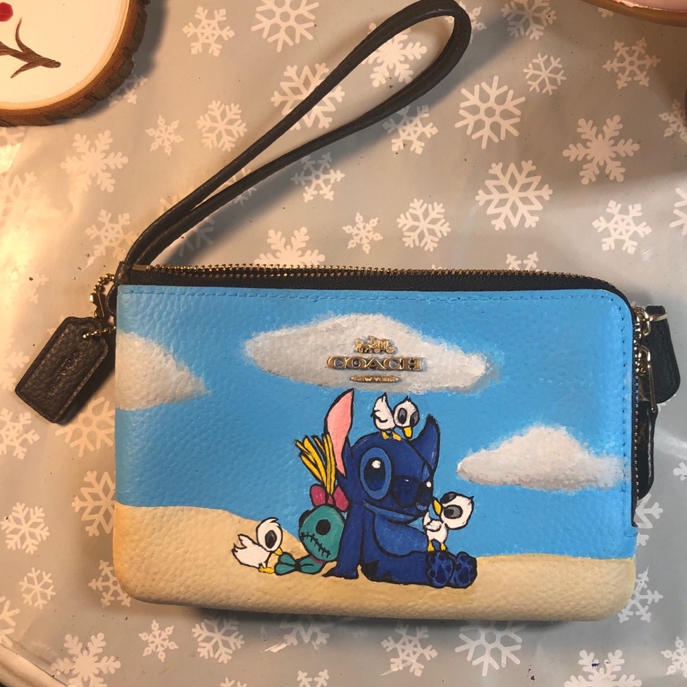 Hand painted stitch coach wristlet